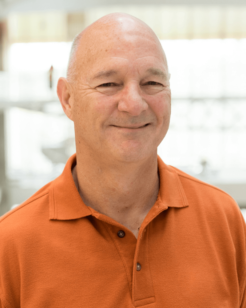 Cockrell School Civil Engineering alumnus Jimmy Canning, wearing a burnt orange polo