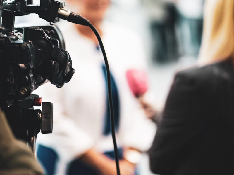 blurred shot of a press conference