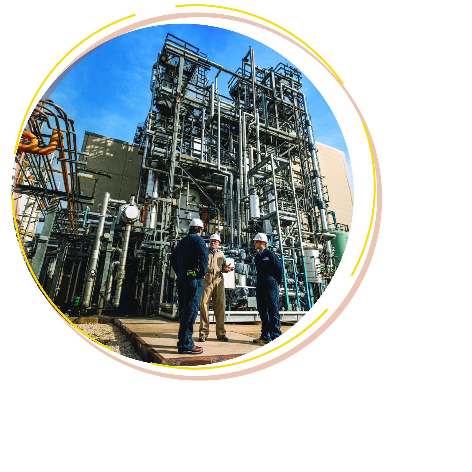 three workers in hardhats talking outside a carbon storage facility