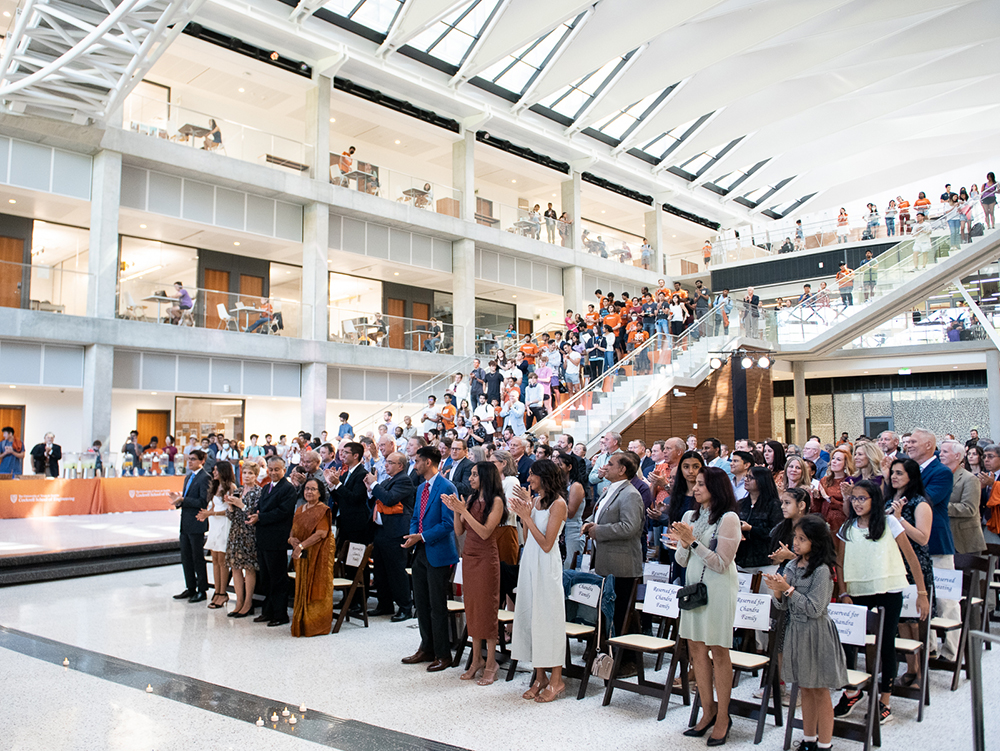 Crowd giving a standing ovation in the Engineering Education and Resource Center