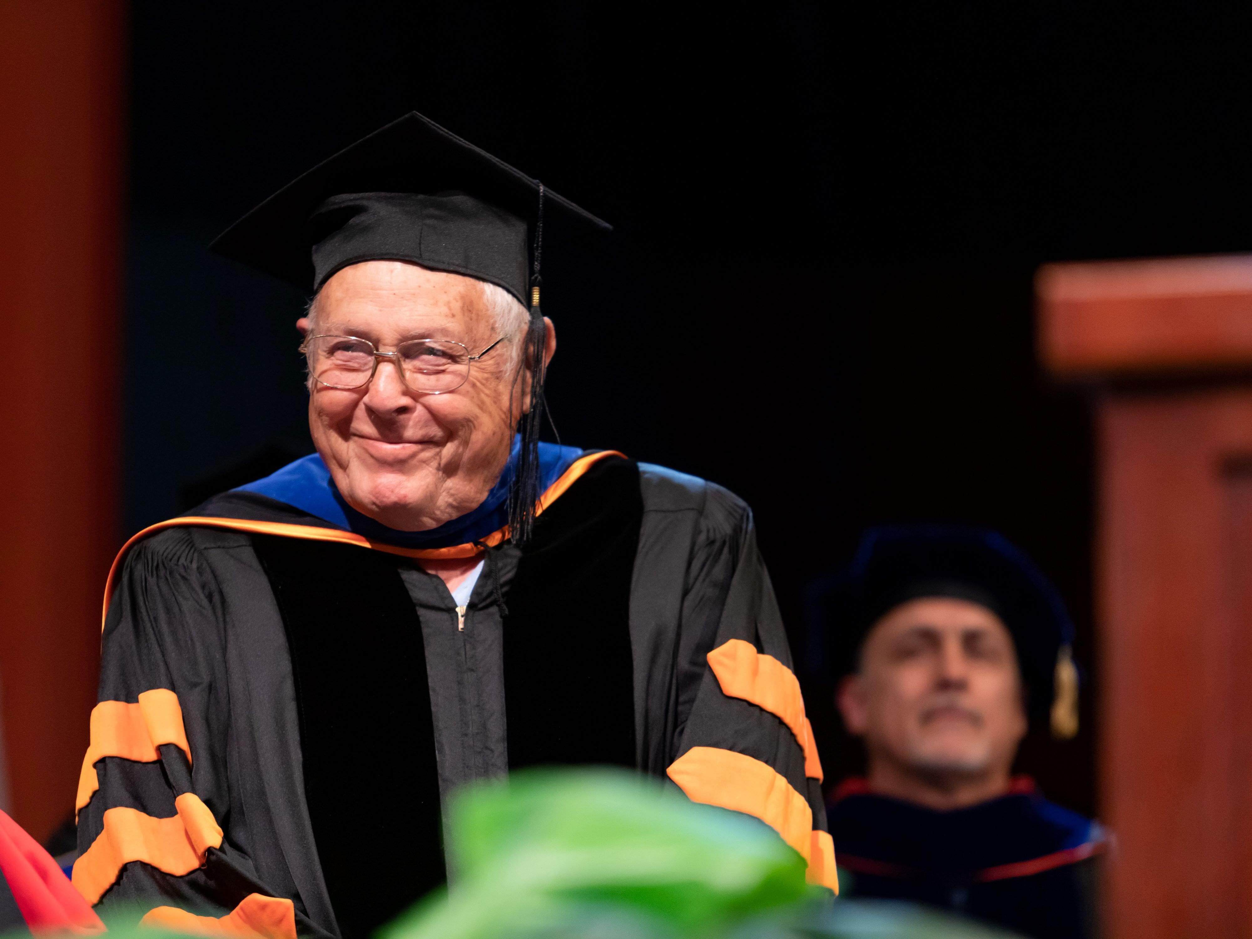 Cockrell School alumnus Lew Griffith smiling in graduation regalia