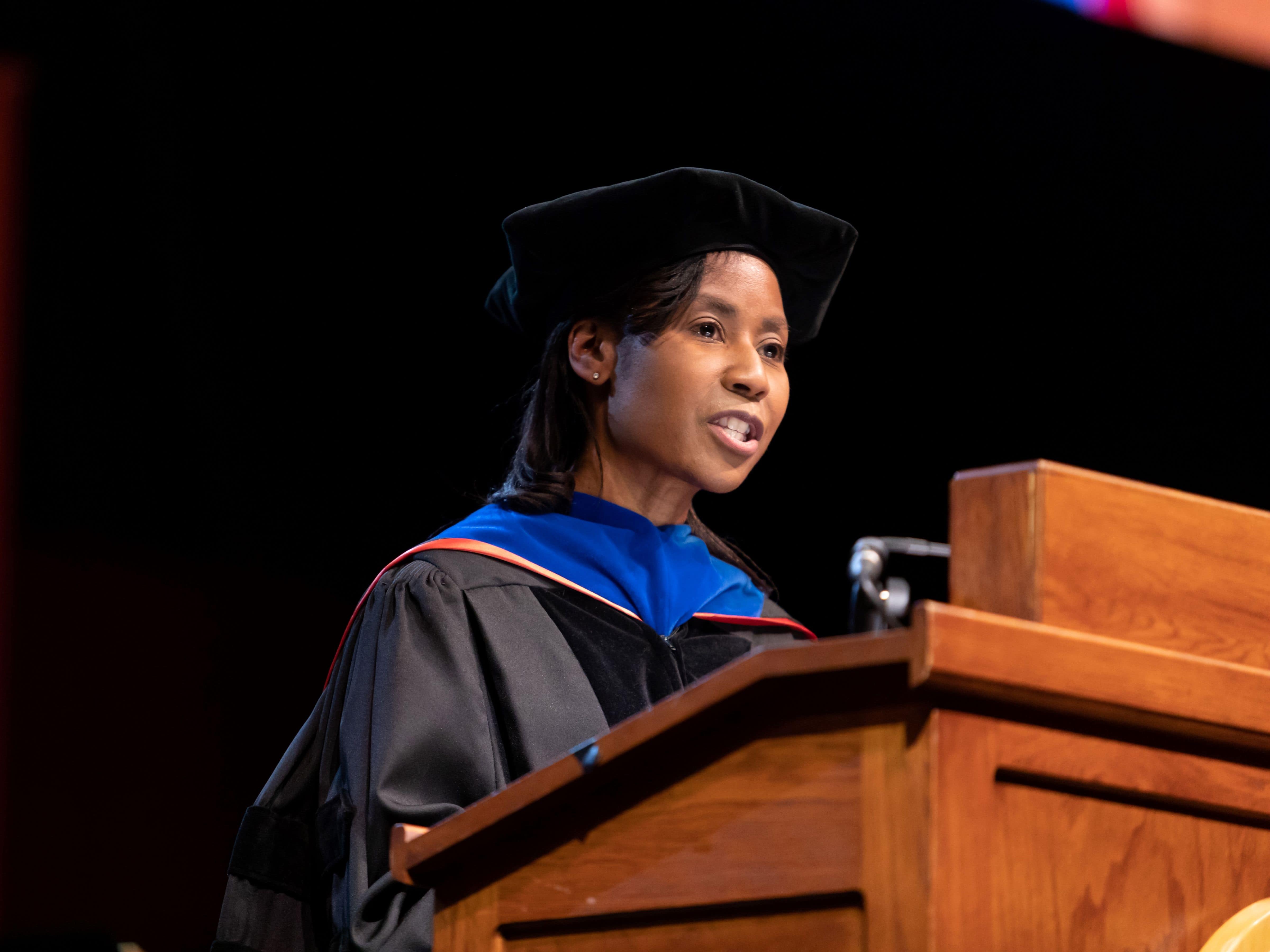 Texas engineering alumnus Stephanie Wilson giving speech at a podium