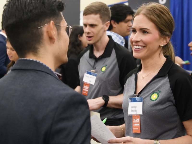 Engineering Expo employer talking to UT Austin student