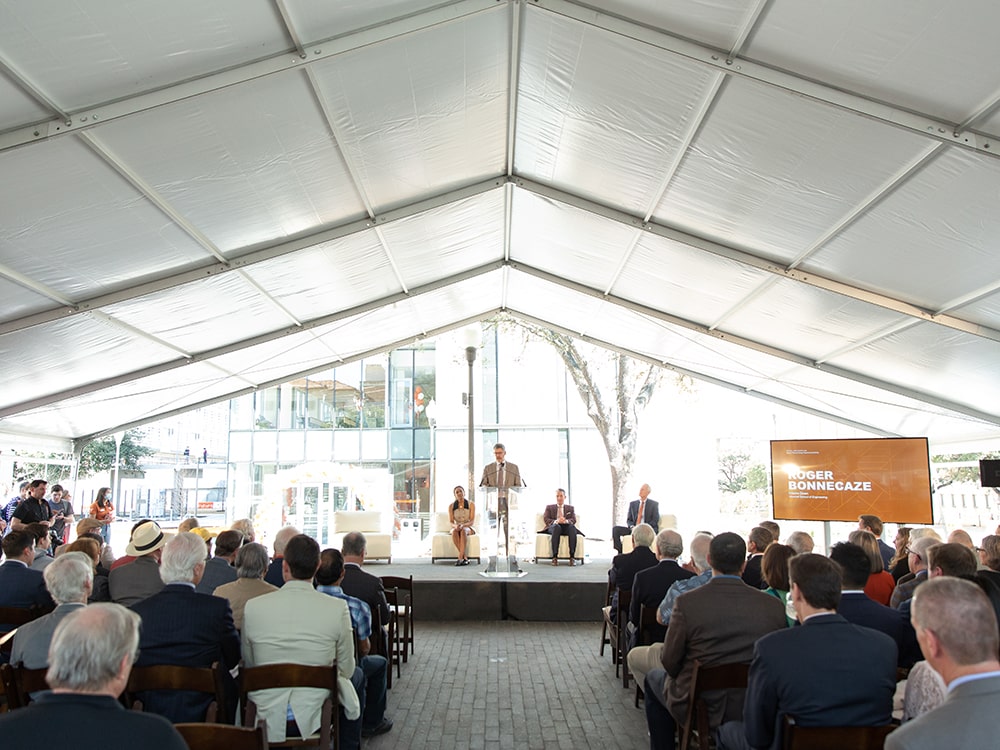 Roger Bonnecaze delivering speech at a podium for the GLT opening ceremony