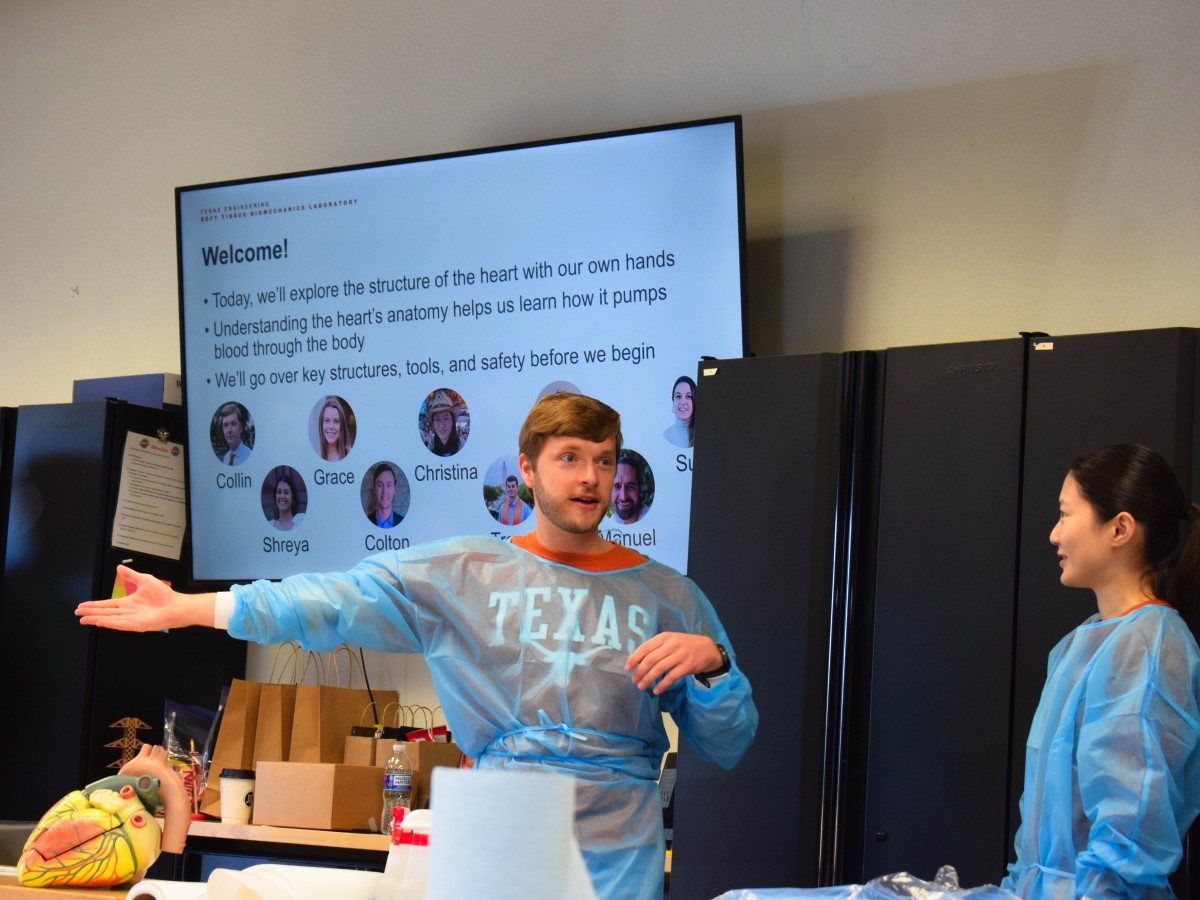 Texas Engineer Collin Haese teaches a heart dissection workshop to kids at the Science Mill