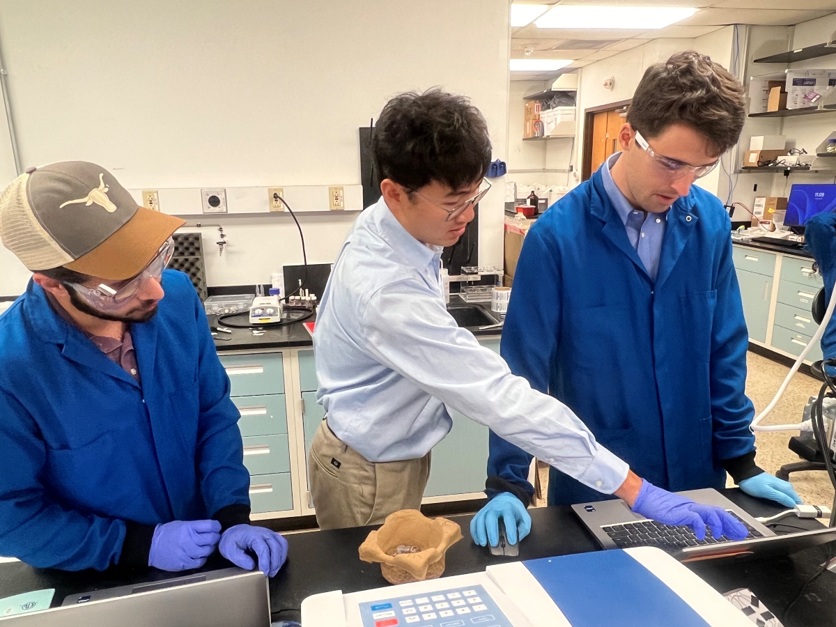 Texas Engineer Kent Zheng and his students in his lab