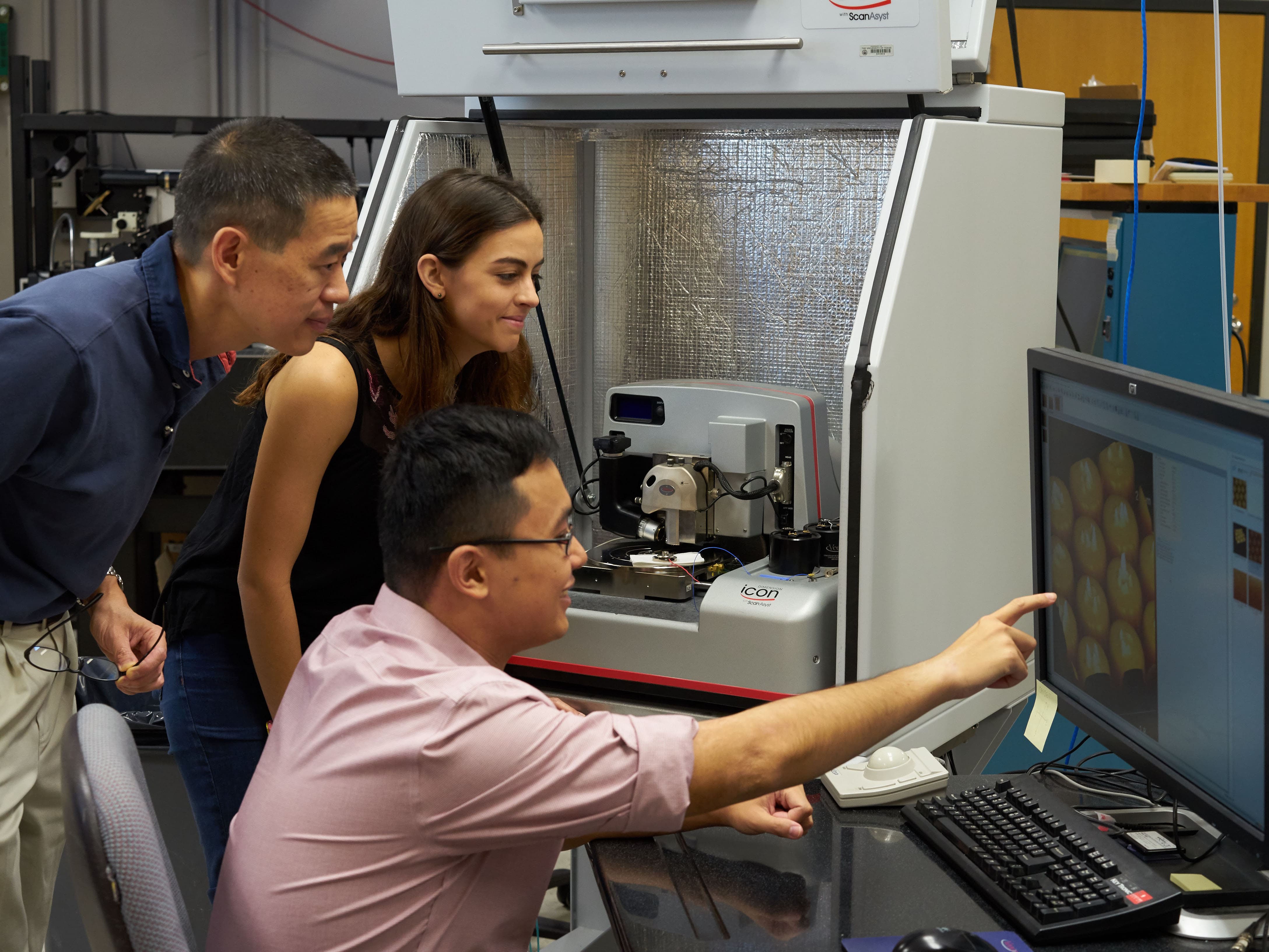 Professor Edward Yu and TX engineering students in the mrsec center