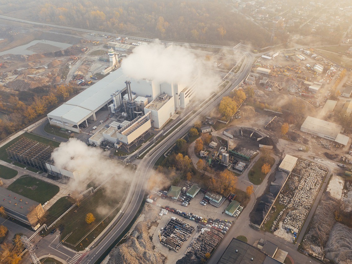 Aerial view of pollution smoke from manufacturing center